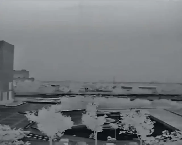 Thermal image of a harbour in white-hot palette
